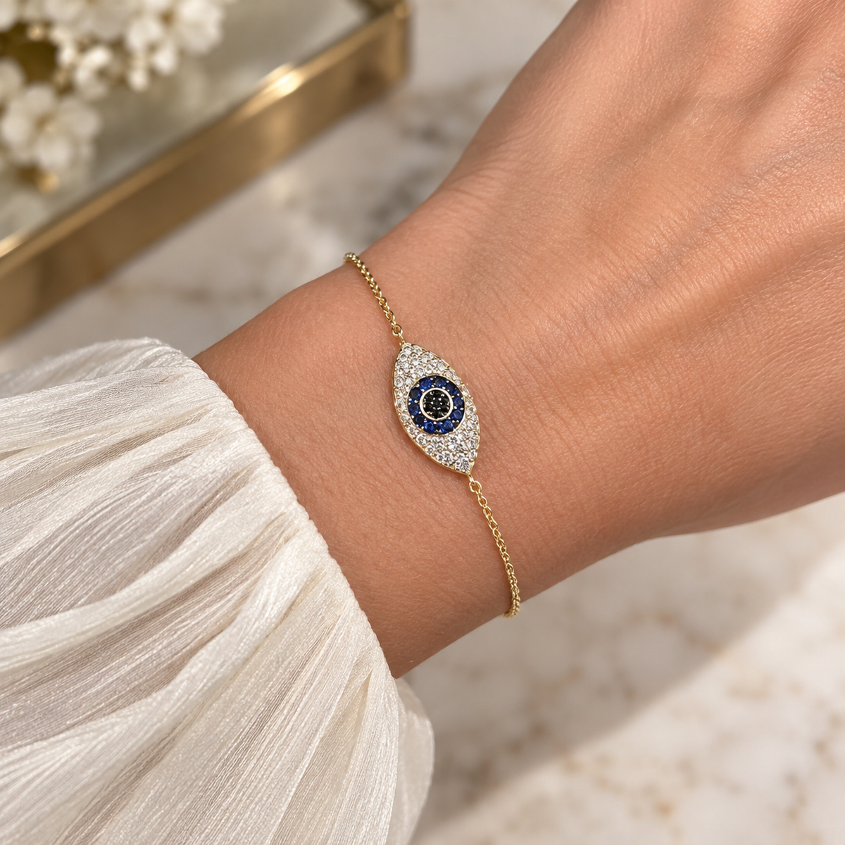 9K Gold Diamond & Sapphire Eye Bracelet