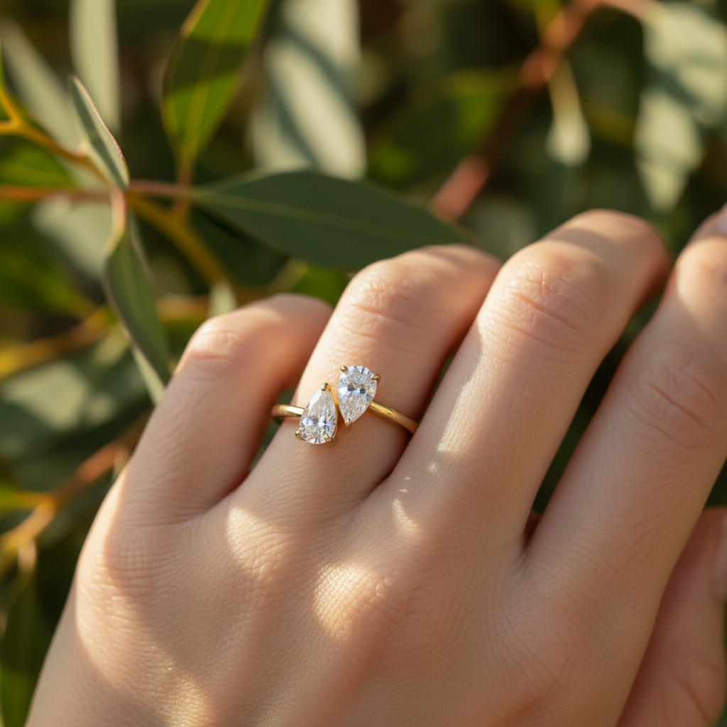 Female hand with green foliage